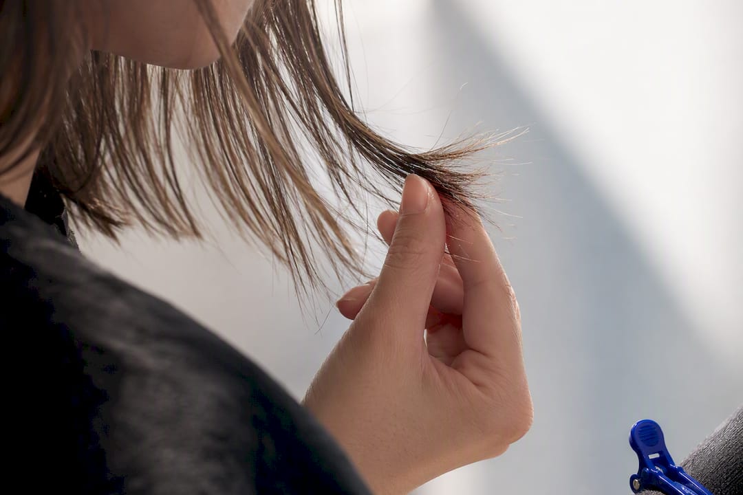 Close-up of fragile fine hair ends